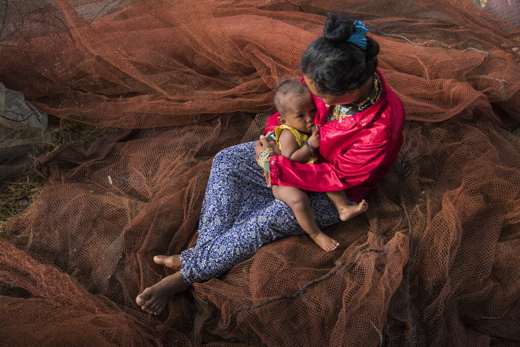 Mother breastfeeding her baby.